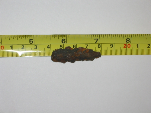 Metal arrow-head-like scrap metal